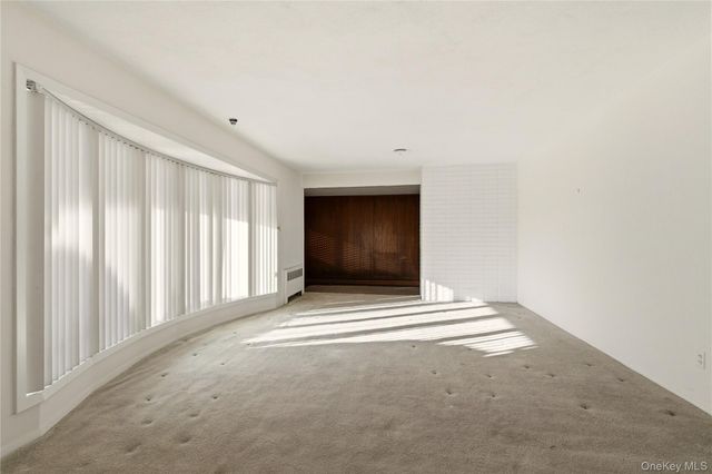 75 Mimosa Drive, East Hills, NY 11576