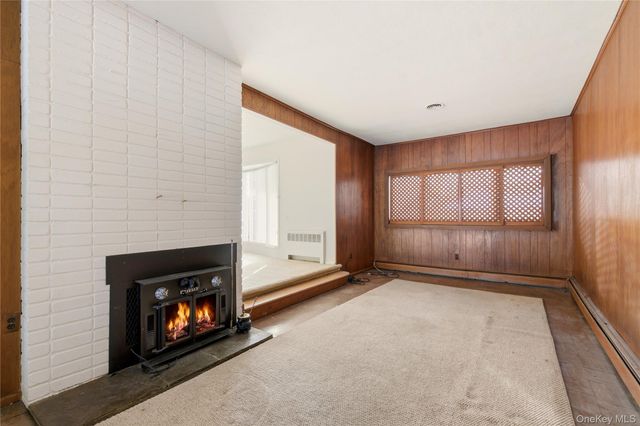 75 Mimosa Drive, East Hills, NY 11576