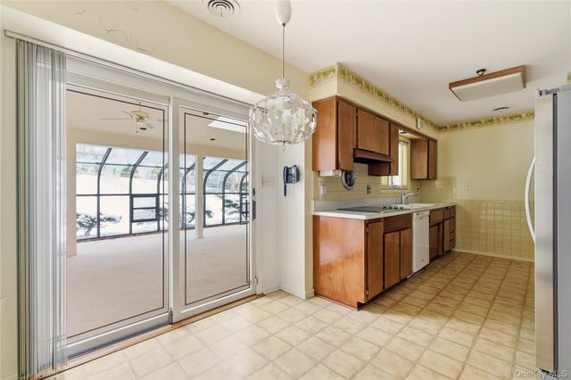 75 Mimosa Drive, East Hills, NY 11576