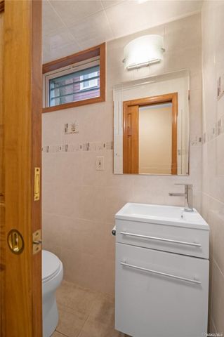 65-24 Ellwell Crescent, Rego Park, NY 11374