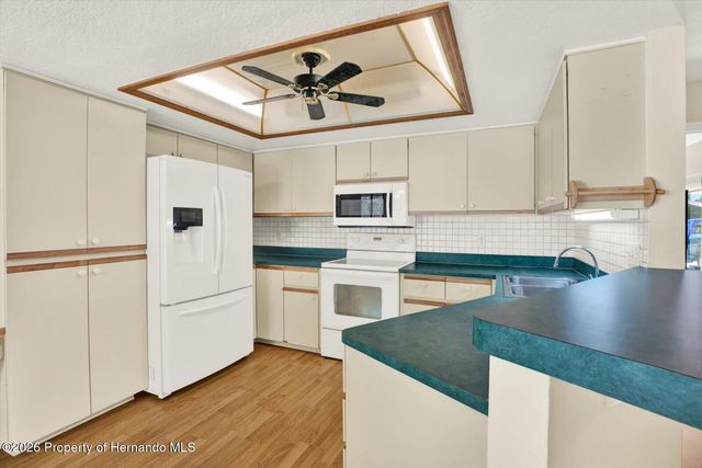 7765 Holiday Drive, Spring Hill, FL 34606