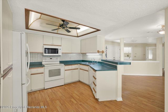 7765 Holiday Drive, Spring Hill, FL 34606