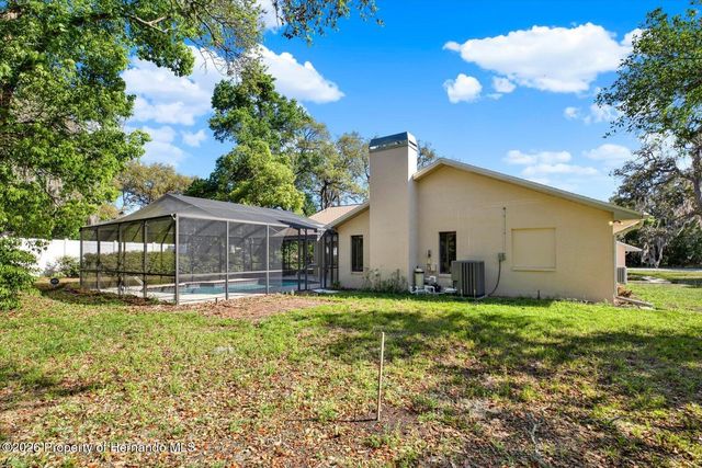 7765 Holiday Drive, Spring Hill, FL 34606