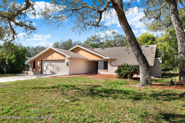 7765 Holiday Drive, Spring Hill, FL 34606