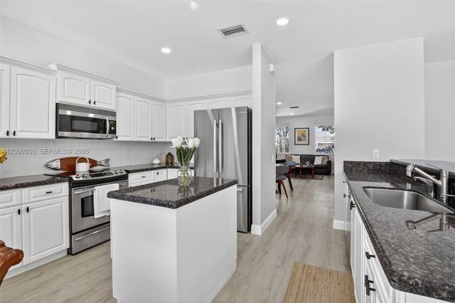 1311 Croton Ct, Weston, FL 33327