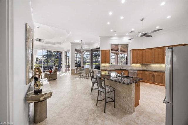 7084 Peach Blossom CT, Naples, FL 34113