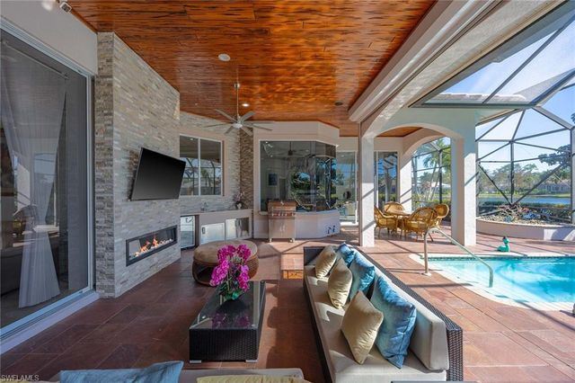 7084 Peach Blossom CT, Naples, FL 34113