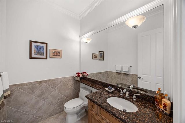 7084 Peach Blossom CT, Naples, FL 34113