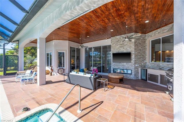 7084 Peach Blossom CT, Naples, FL 34113