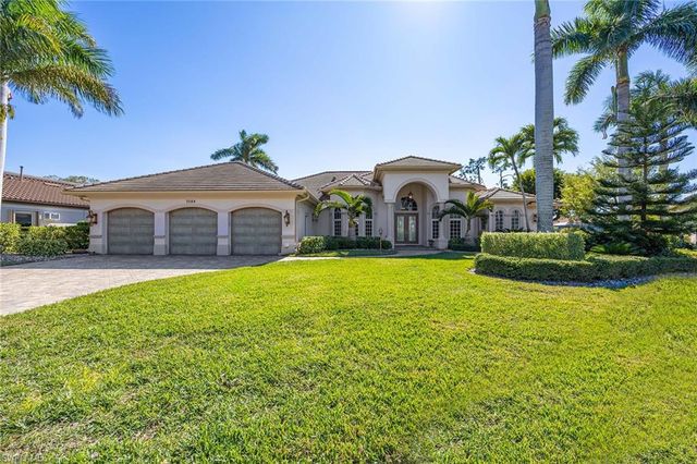 7084 Peach Blossom CT, Naples, FL 34113