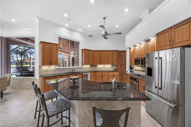 7084 Peach Blossom CT, Naples, FL 34113