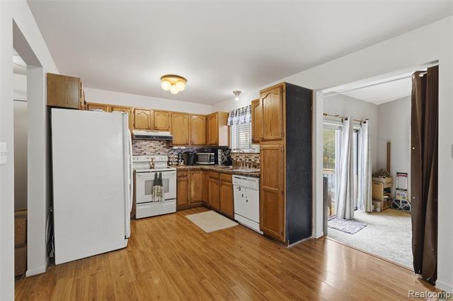 9293 Wildwood Lake Drive, Whitmore Lake, MI 48189