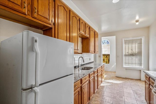 97-19 87th Street, Ozone Park, NY 11416