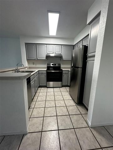 14013 FAIRWAY ISLAND DRIVE 415, Orlando, FL 32837