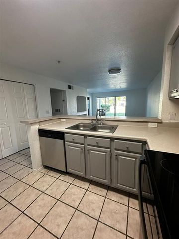14013 FAIRWAY ISLAND DRIVE 415, Orlando, FL 32837