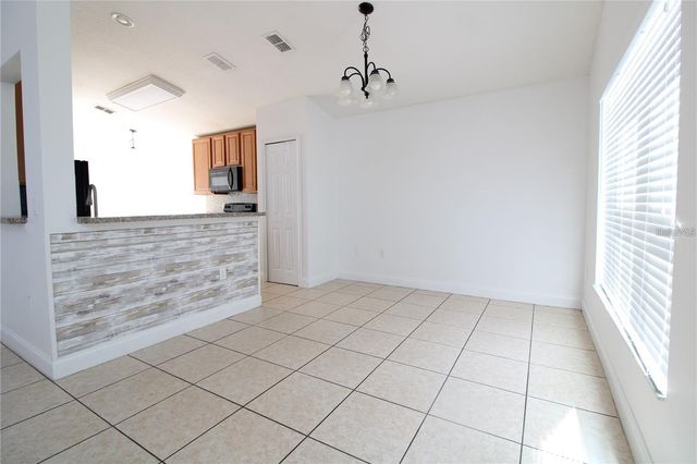 11414 PINEWOOD COVE LANE, Orlando, FL 32817