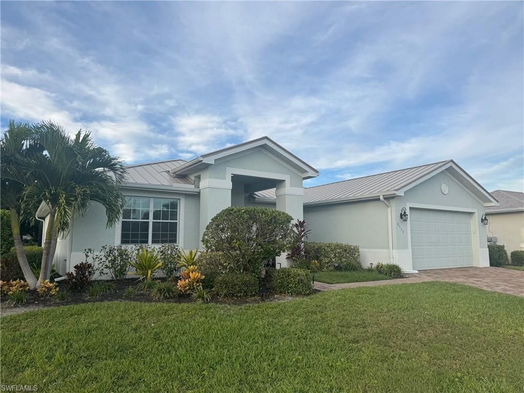 2557 Ashbury CIR, CAPE CORAL, FL 33991 — photo 2