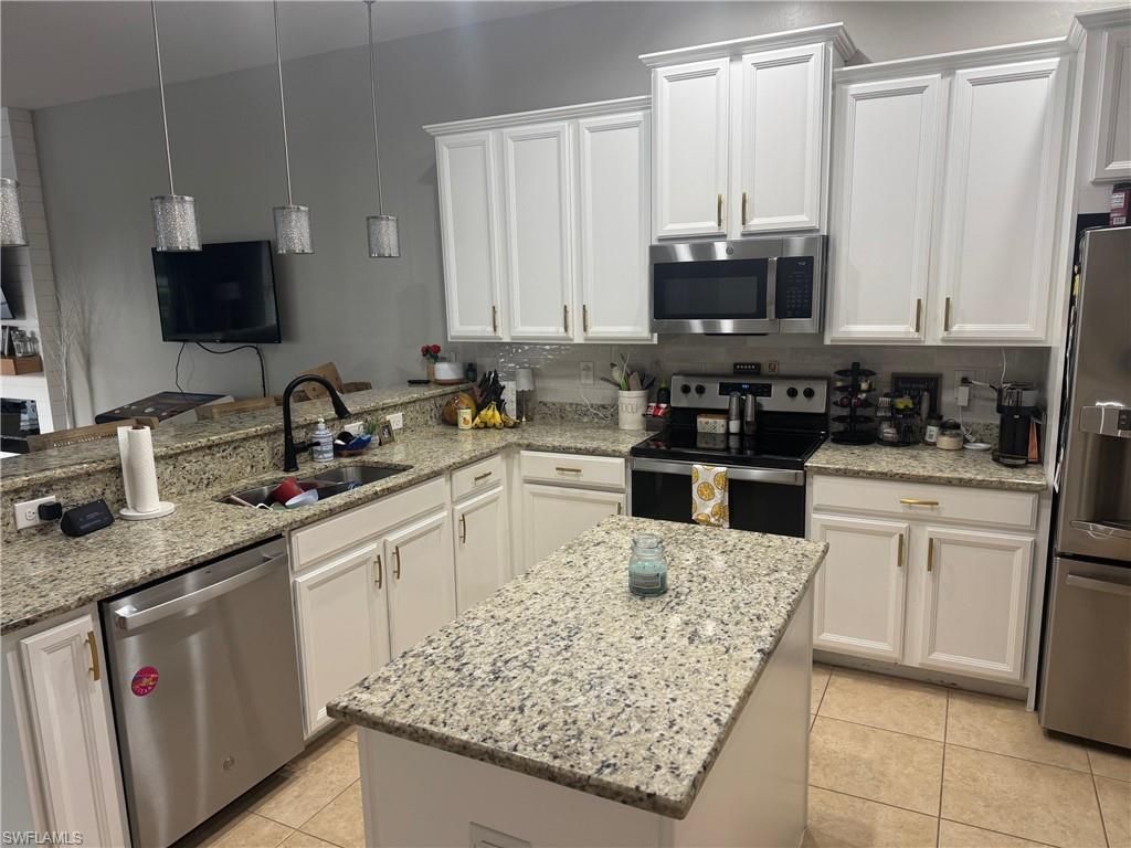 2557 Ashbury CIR, CAPE CORAL, FL 33991 — photo 5