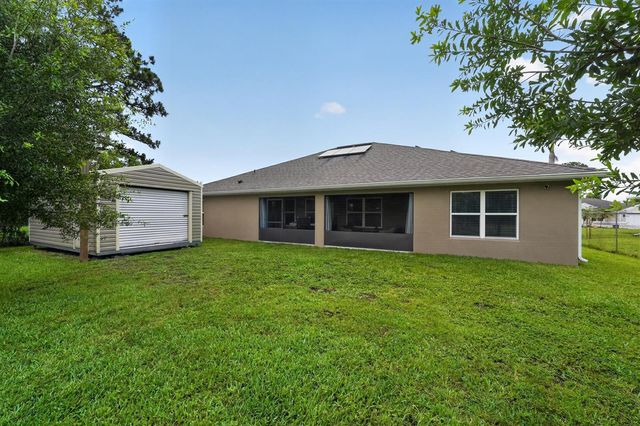 1858 SW Mackenzie Street, Port St. Lucie, FL 34953