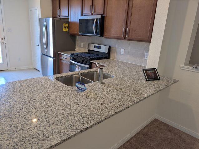 3038 Dardanos Lane, Fresno, TX 77545