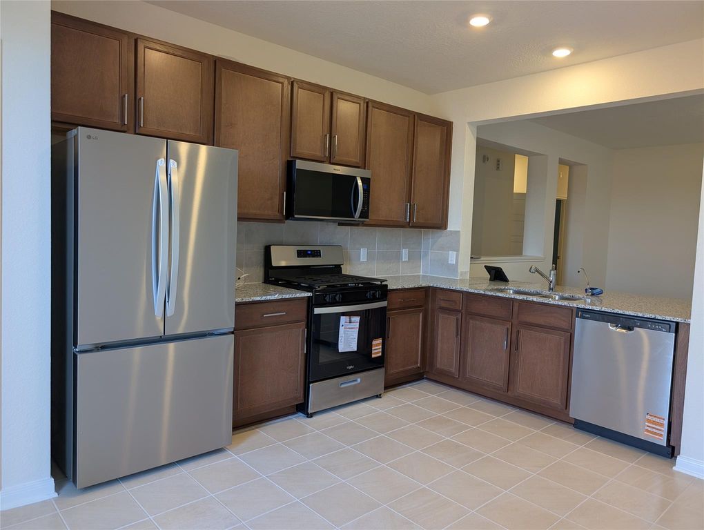 3038 Dardanos Lane, Fresno, TX 77545