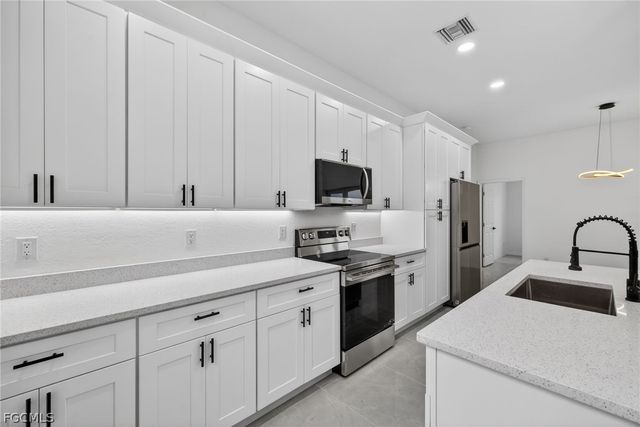 3110 32nd ST W, Lehigh Acres, FL 33971