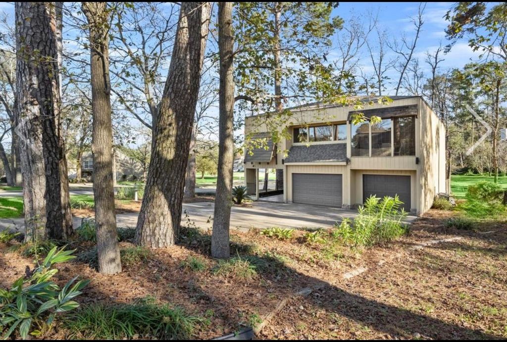 99 April Wind Drive N, Conroe, TX 77356