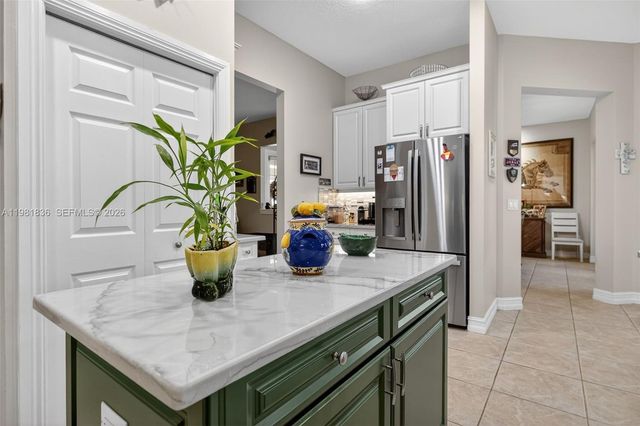 7702 SE Mammoth Dr, Hobe Sound, FL 33455