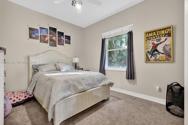 7702 SE Mammoth Dr, Hobe Sound, FL 33455