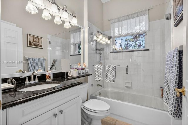 7702 SE Mammoth Dr, Hobe Sound, FL 33455