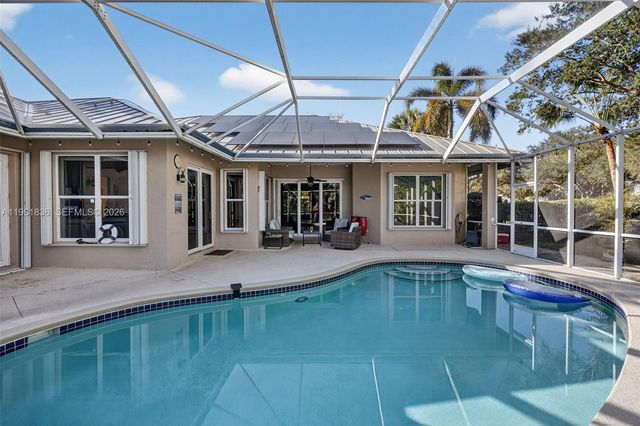 7702 SE Mammoth Dr, Hobe Sound, FL 33455