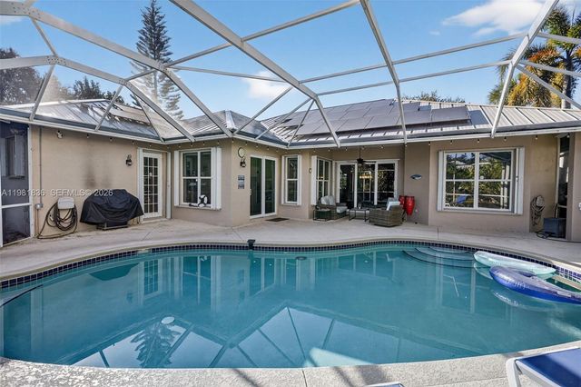 7702 SE Mammoth Dr, Hobe Sound, FL 33455