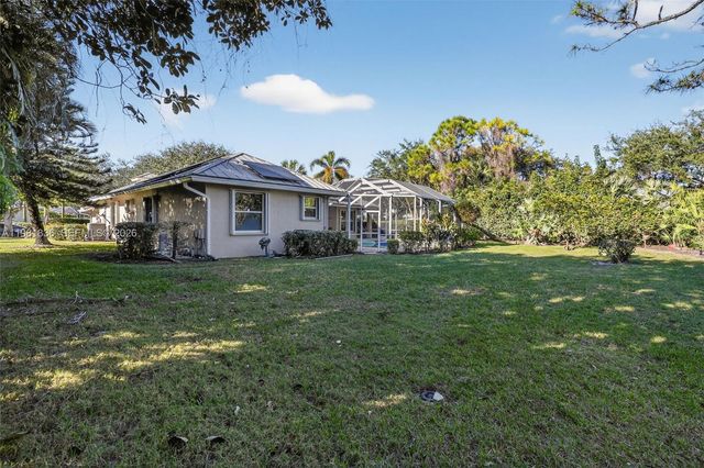 7702 SE Mammoth Dr, Hobe Sound, FL 33455