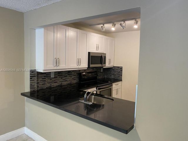721 N Pine Island Rd 304, Plantation, FL 33324