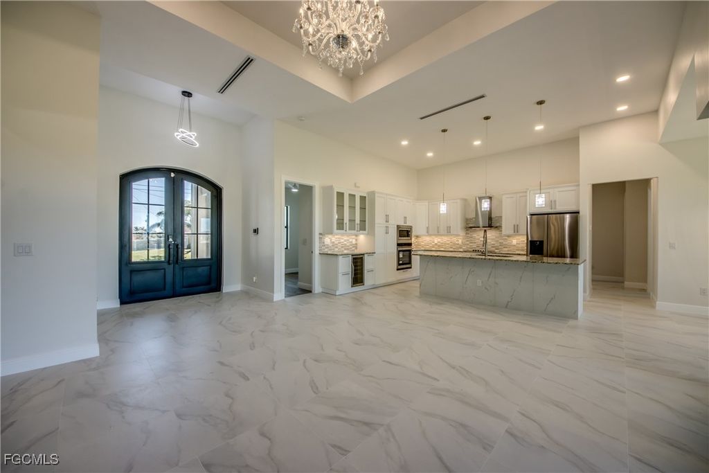 Image 5 of property listing at 2332 NW 35th PL, Cape Coral, FL 33993