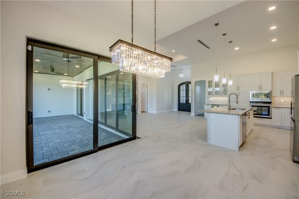 Image 6 of property listing at 2332 NW 35th PL, Cape Coral, FL 33993