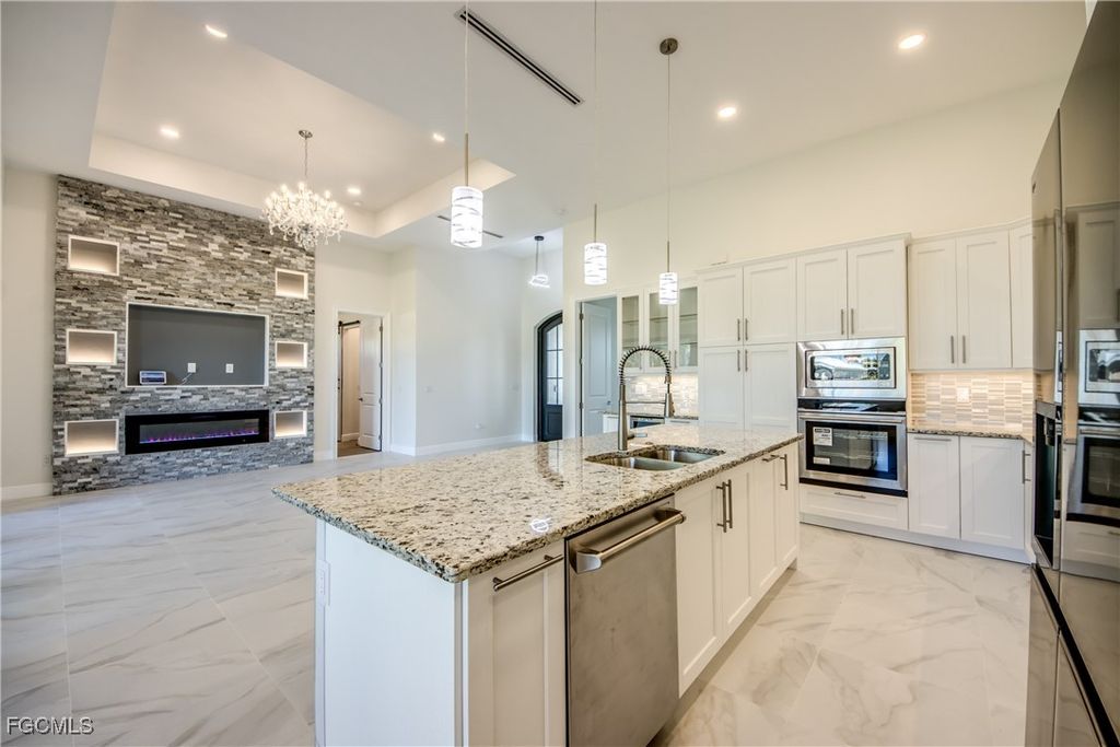 Image 7 of property listing at 2332 NW 35th PL, Cape Coral, FL 33993