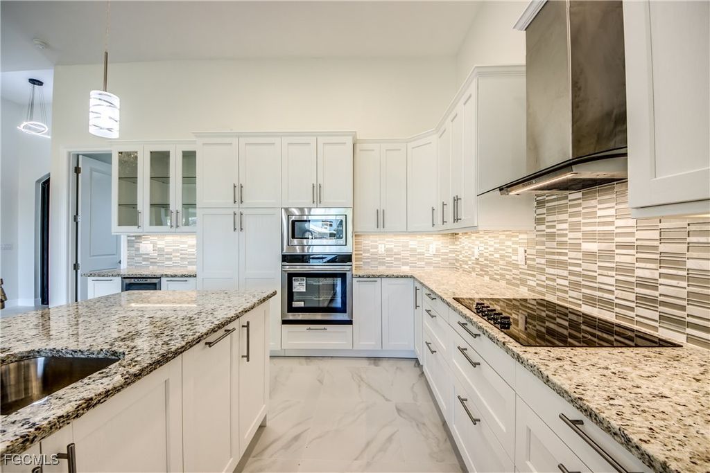 Image 8 of property listing at 2332 NW 35th PL, Cape Coral, FL 33993