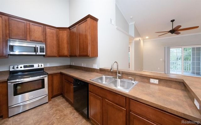 6600 TRILLIUM VILLAGE Lane 23, Independence Charter Township, MI 48346