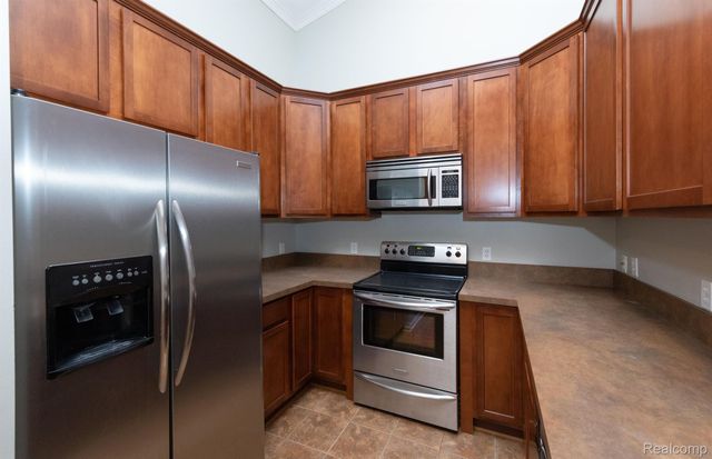 6600 TRILLIUM VILLAGE Lane 23, Independence Charter Township, MI 48346