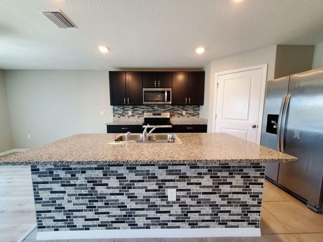 1014 GOLDEN SHINER AVENUE, Ruskin, FL 33570