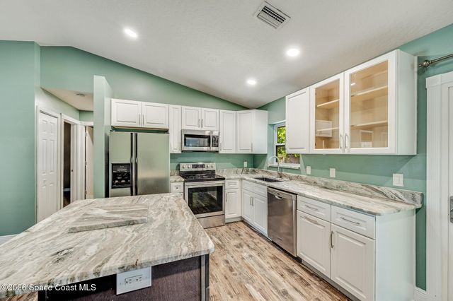 1631 Santonian Street SE, Palm Bay, FL 32909