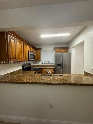 1566 Lake Crystal Dr E, West Palm Beach, FL 33411