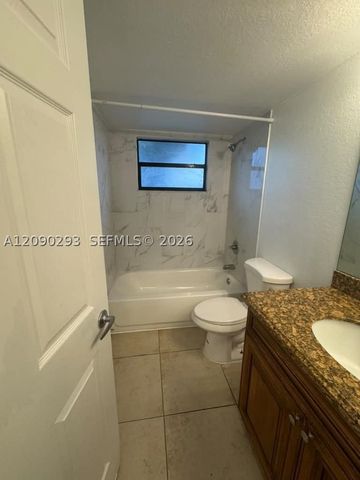 1566 Lake Crystal Dr E, West Palm Beach, FL 33411