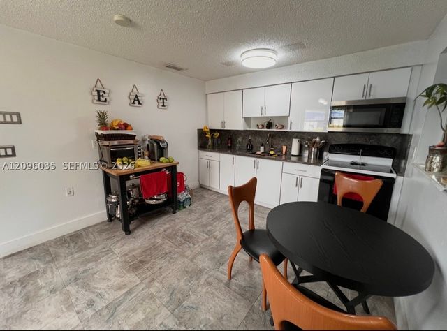 12510 W Golf Dr, Miami, FL 33167