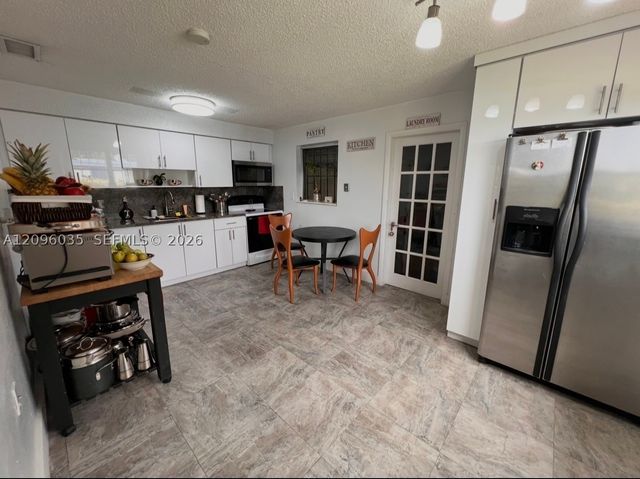 12510 W Golf Dr, Miami, FL 33167