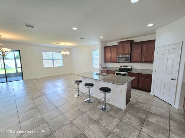 1723 Musgrass Circle, West Melbourne, FL 32904