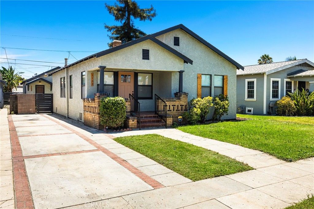 Image 1 of property listing at 1132 W 56th, Los Angeles, CA 90037