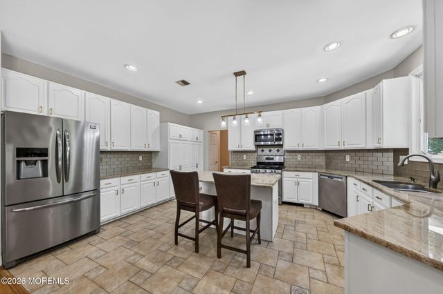 416 Coral Court, Morganville, NJ 07751