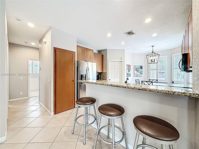 1668 Winterberry Ln, Weston, FL 33327